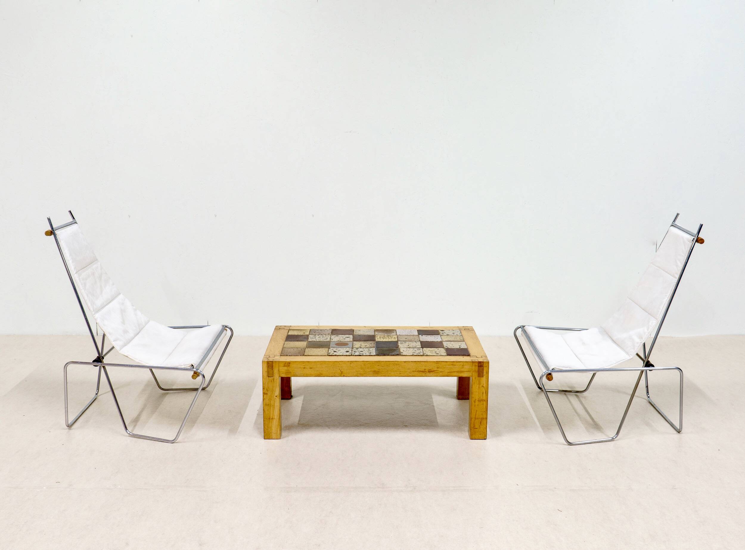 A pair of low chairs. France 70s