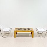 A pair of low chairs. France 70s