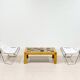 A pair of low chairs. France 70s