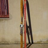 Pair of old wooden skis and metal bindings altiere