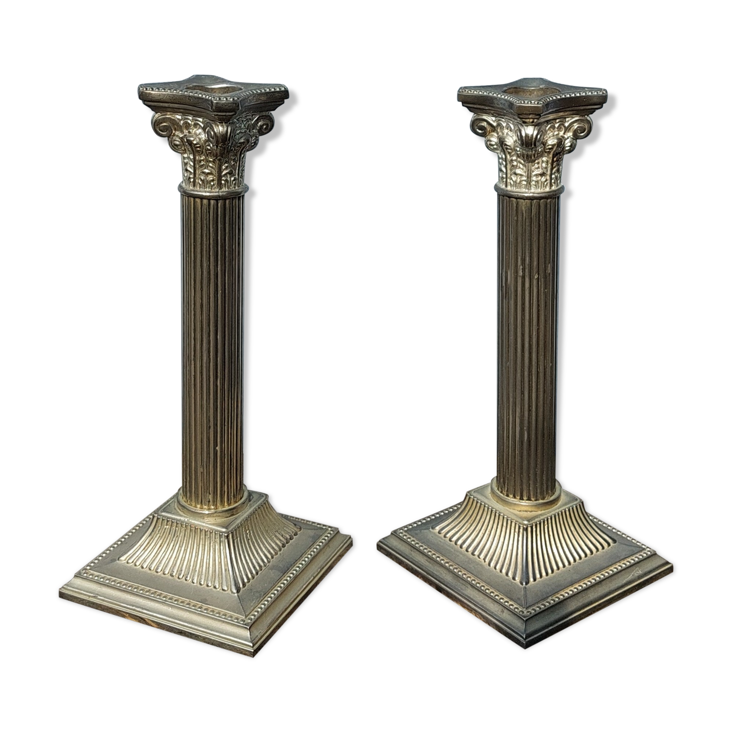 Duo of silver metal column candle holders