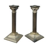 Duo of silver metal column candle holders