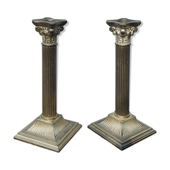 Duo of silver metal column candle holders