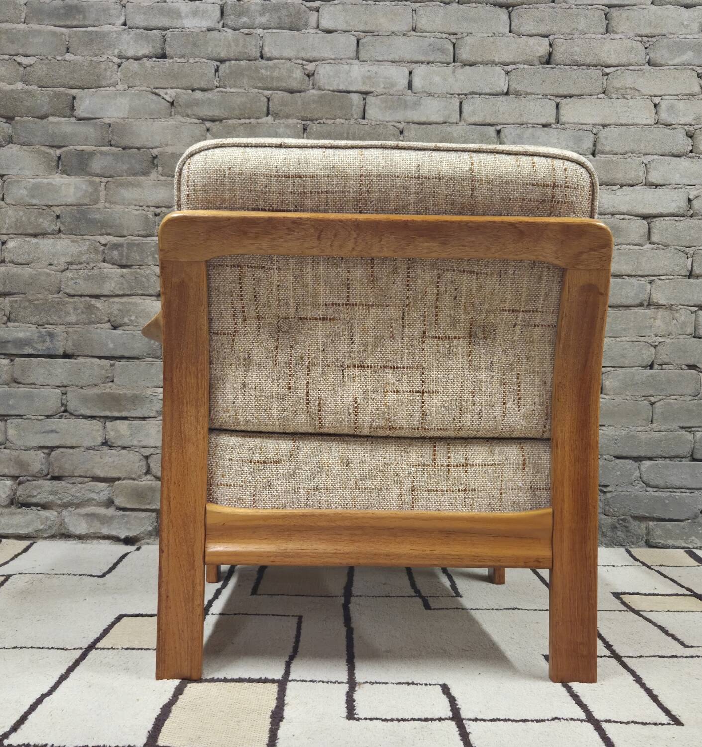 Danish canapé and its 1970s teak armchair