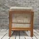 Danish canapé and its 1970s teak armchair