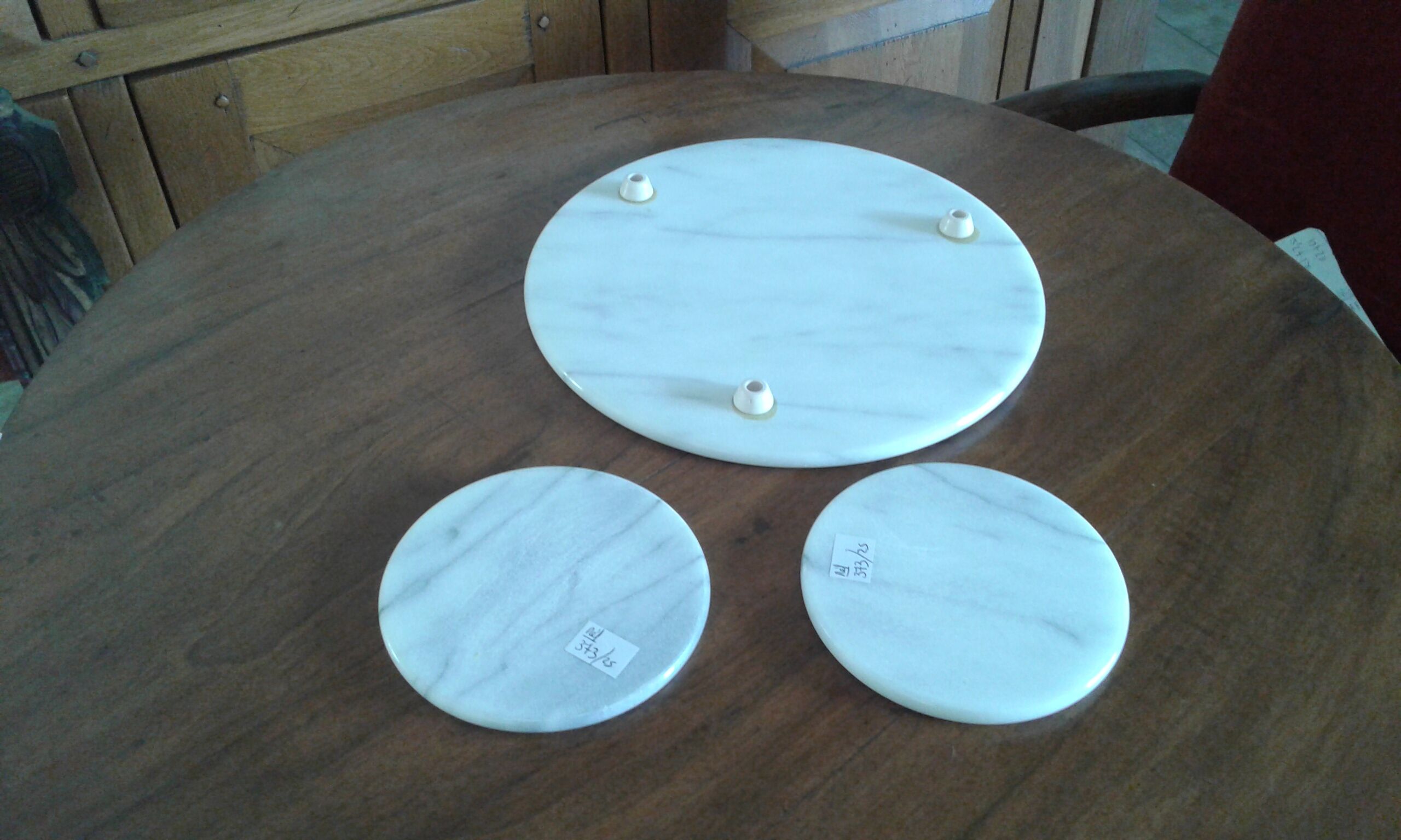 Set under dish and 2 under marble bottle