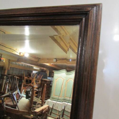 Large beveled mirror, simple wooden frame