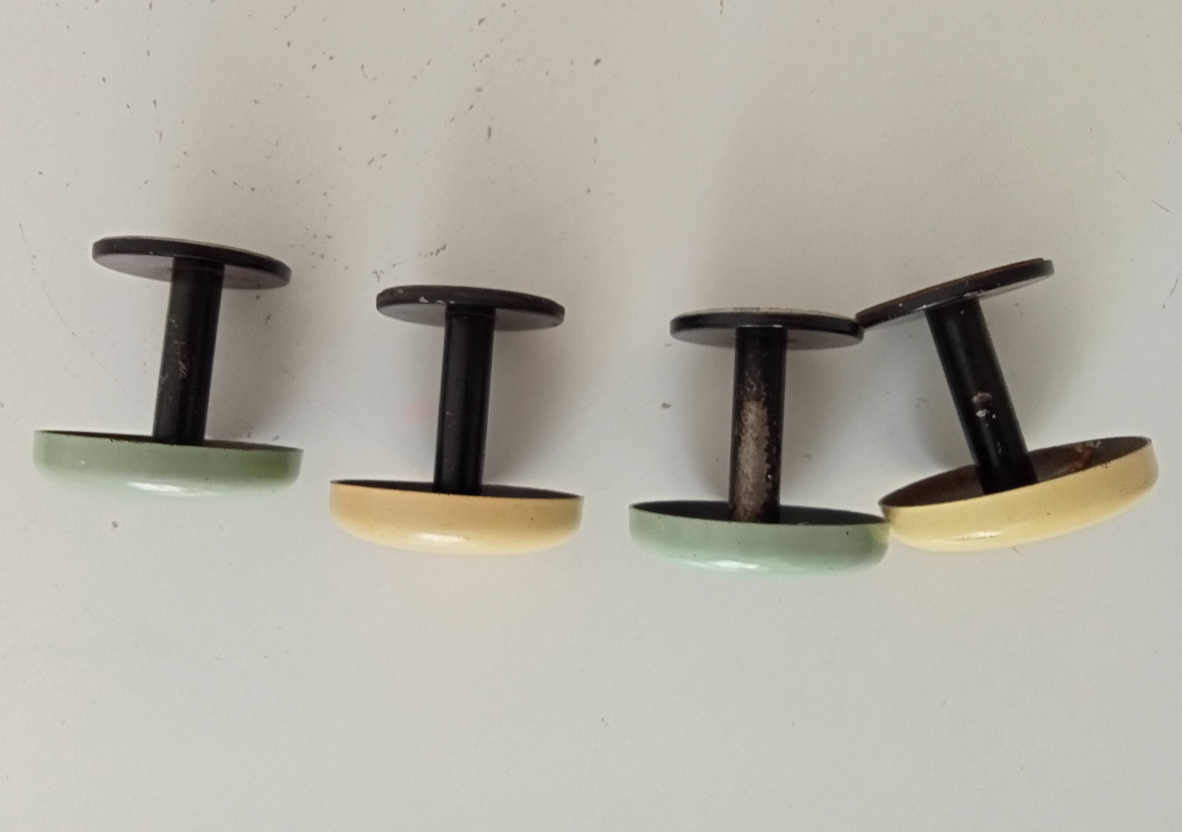Set of 4 vintage coat hooks from the 1960s.
