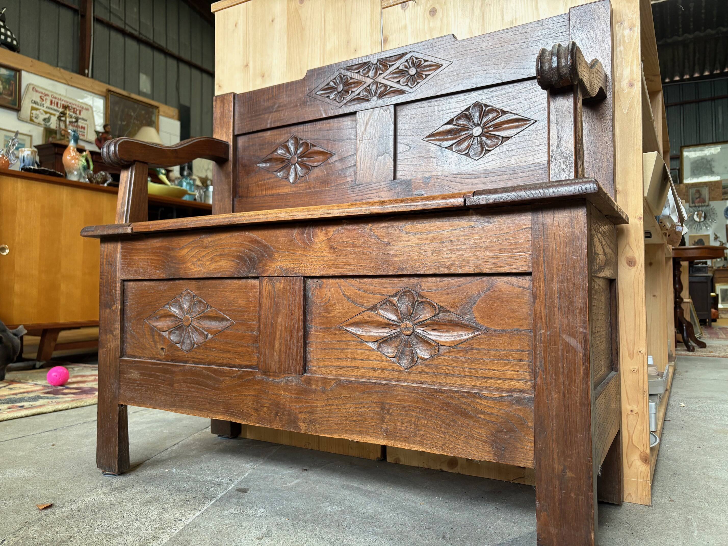 Antique carved wooden storage bench