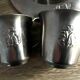 2 plates and 2 silver-plated metal cups by Gero Zilmeta with rabbit designs.