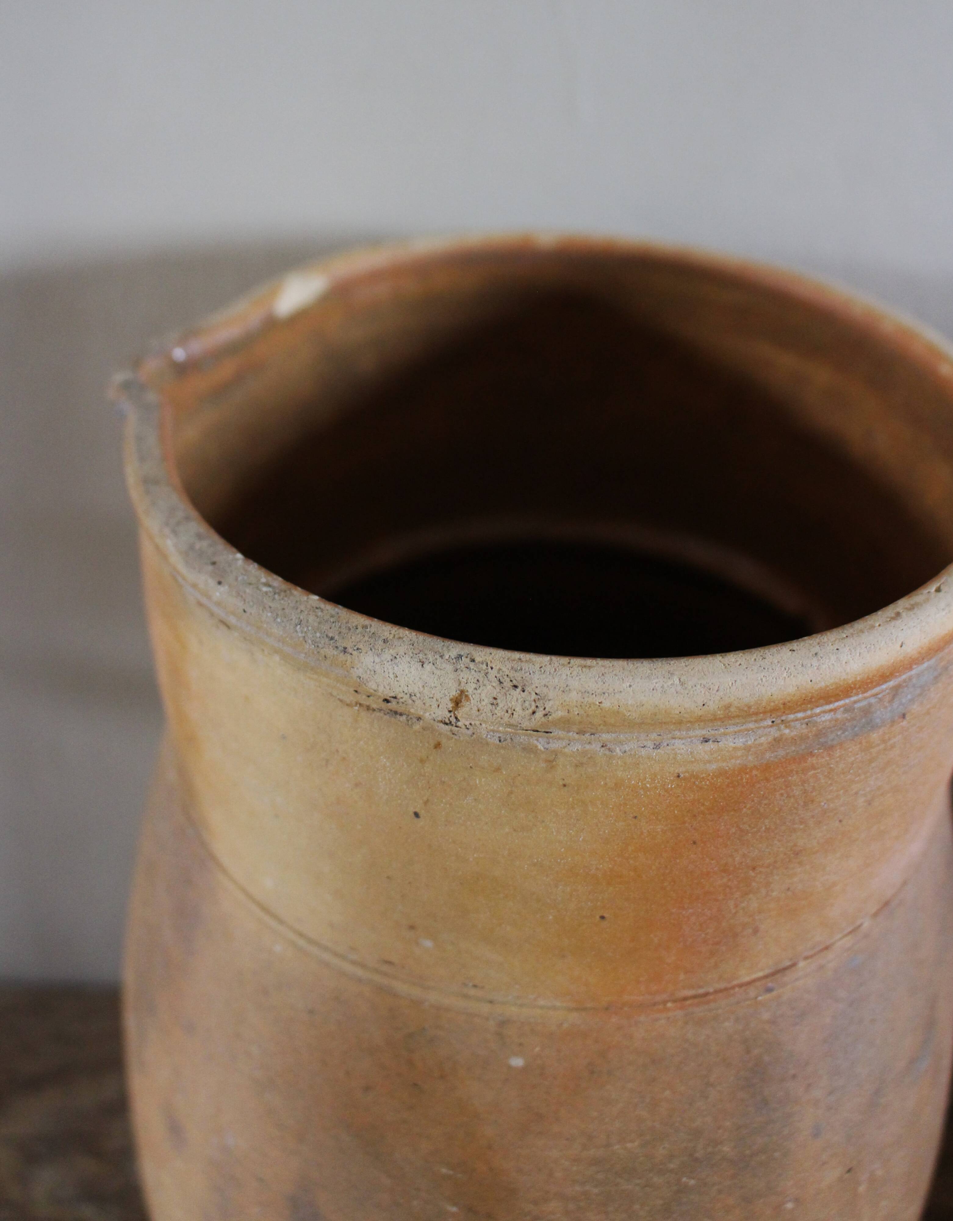 Vintage artisanal terracotta jug