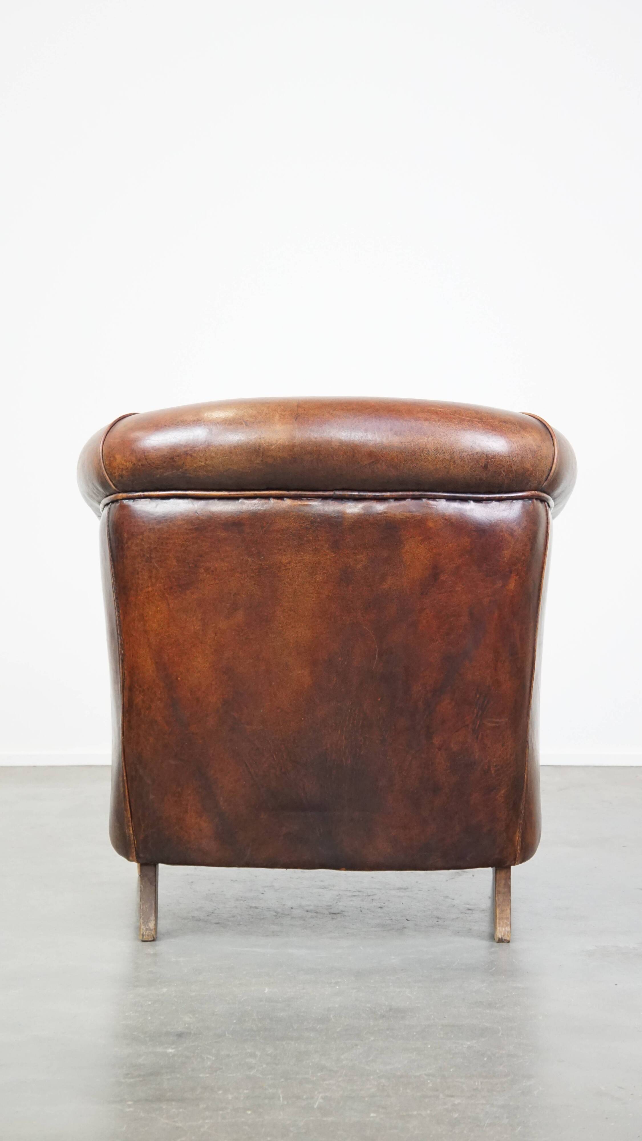 Cognac-colored sheepskin leather club chair