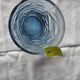 Blue glass with fruit relief decoration