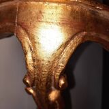 Corner console in gilded wood