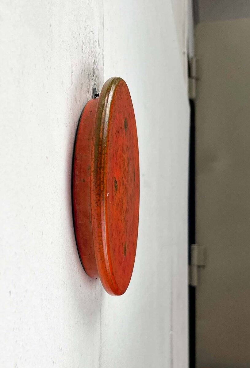 Mid-century modern Danish studio pottery, orange wall coat rack by Signe Boesen Northroup, 1960s.