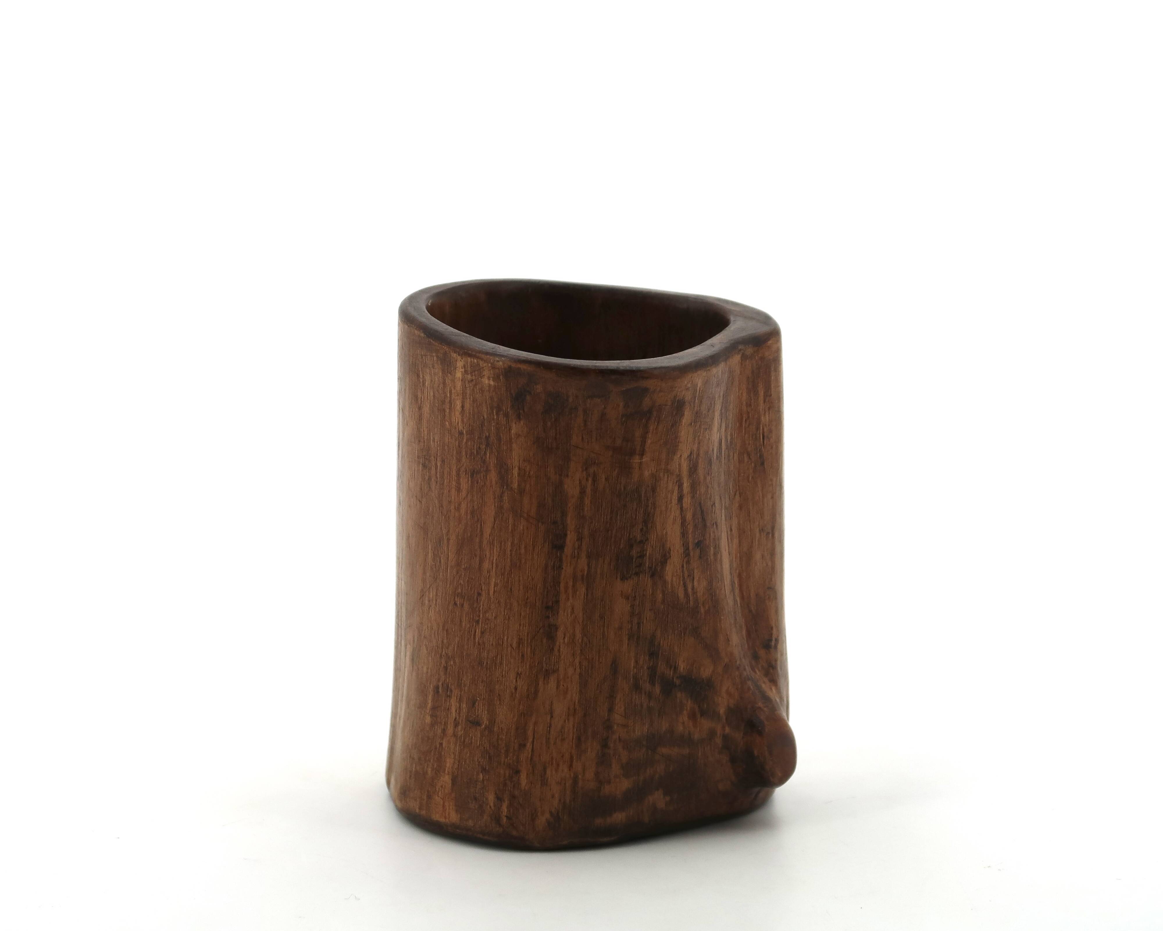 Small brutalist monoxyle vase in wood, 1970s.