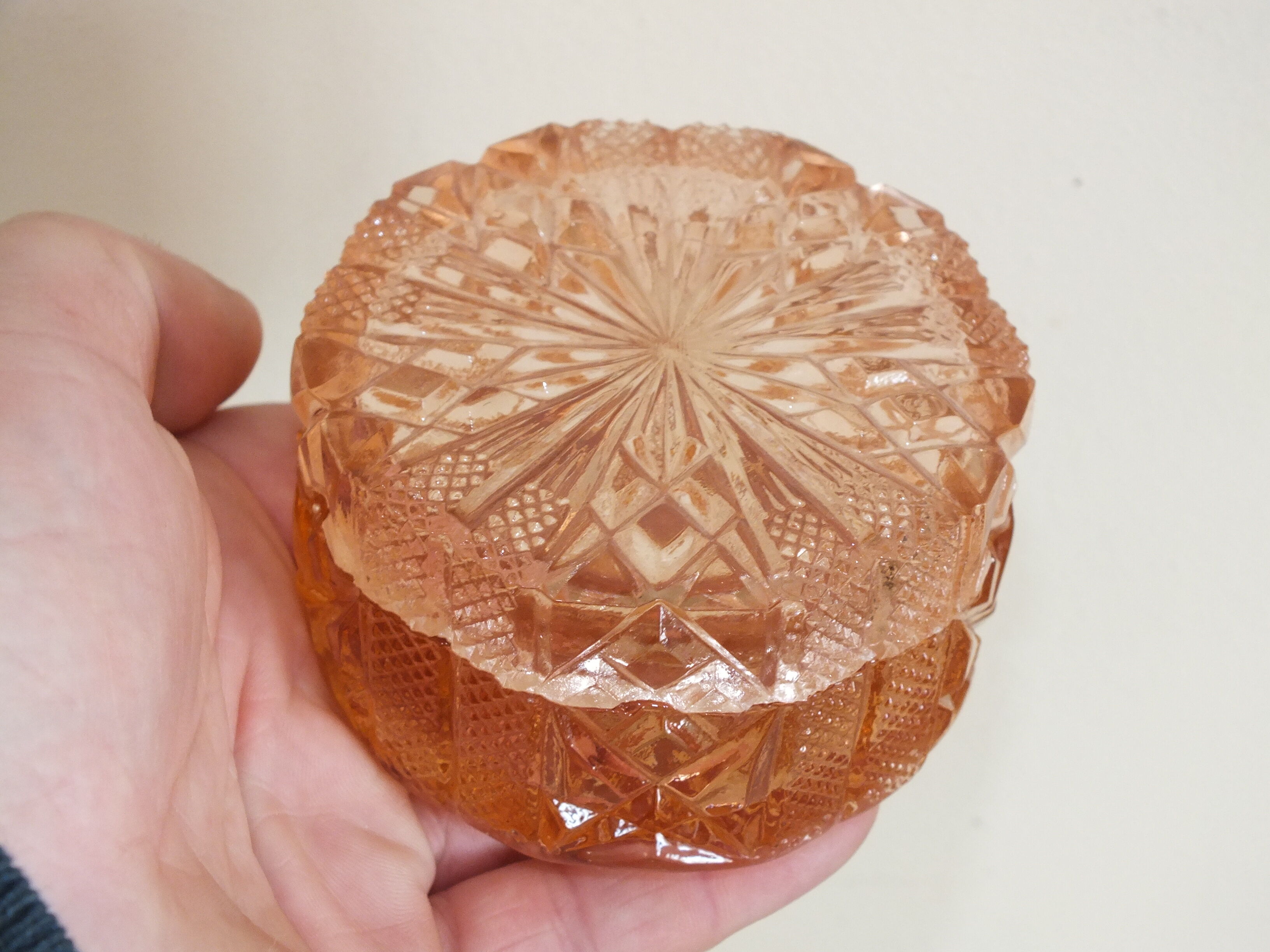 Pink tinted molded crystal powder box