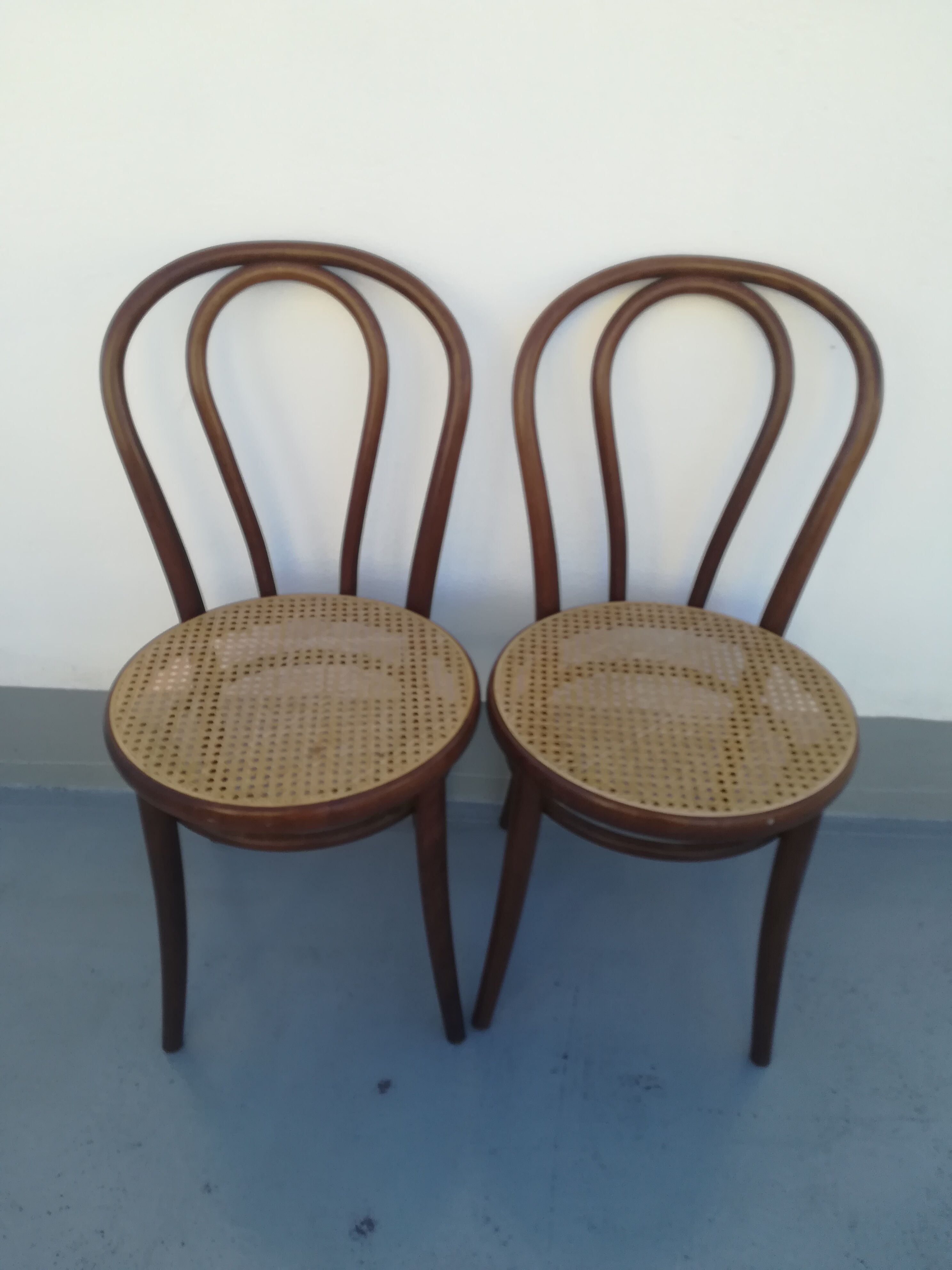 2 Curved wooden bistro chairs