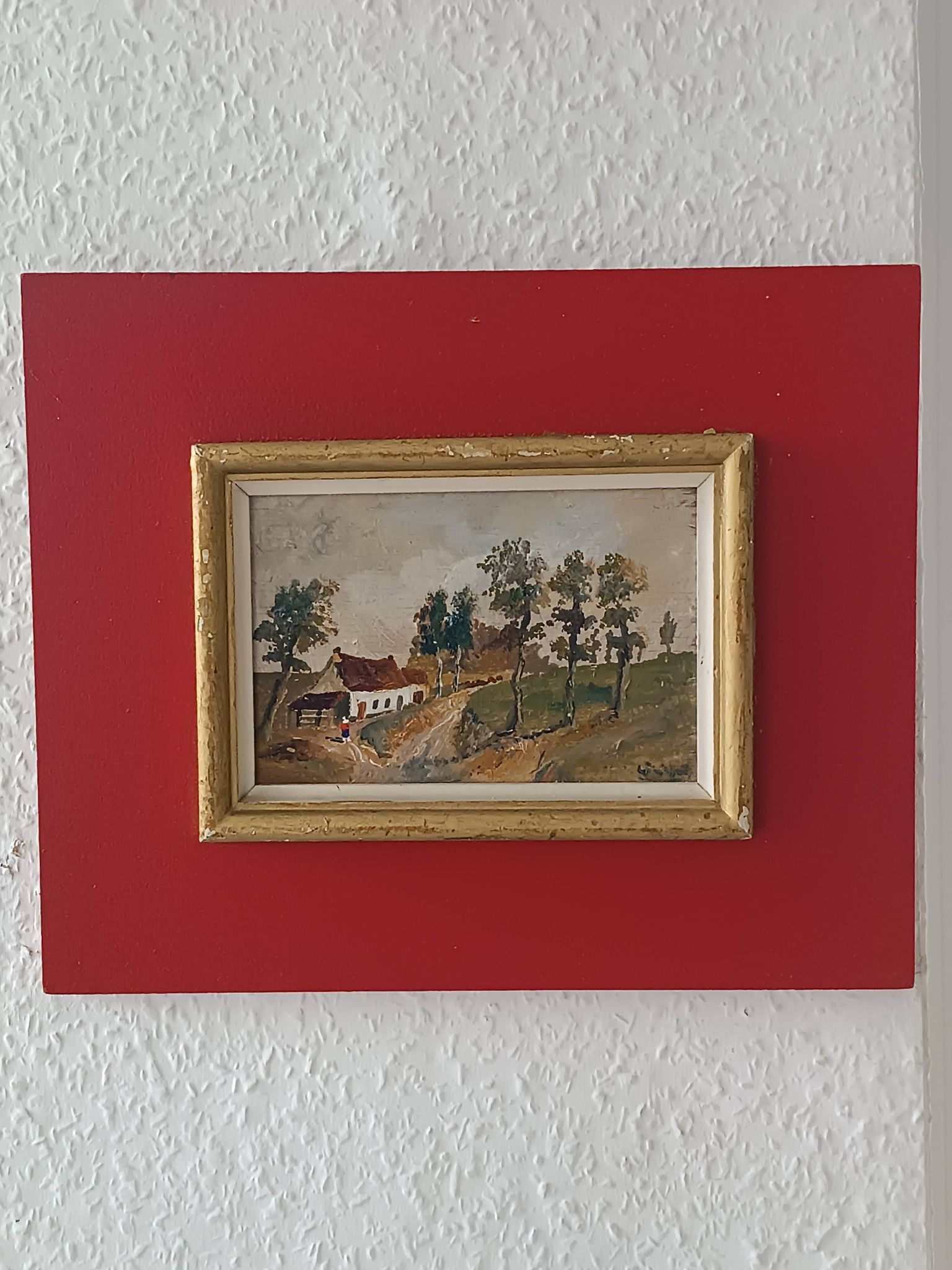 Framed oil on panel of an old countryside landscape.
