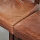 Set of 4 cognac-coloured cowleather dining chairs with decorative nails