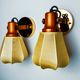 Pair of articulated "Cocoon" wall lights, resin and pine, Italy, 1970