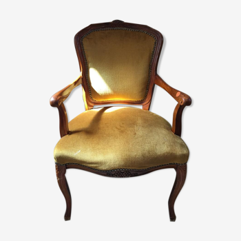 Yellow velvet armchair