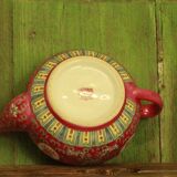 Chinese pink mu shou teapot and its cups