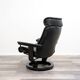 Scandinavian reclining armchair with footrest, stressless