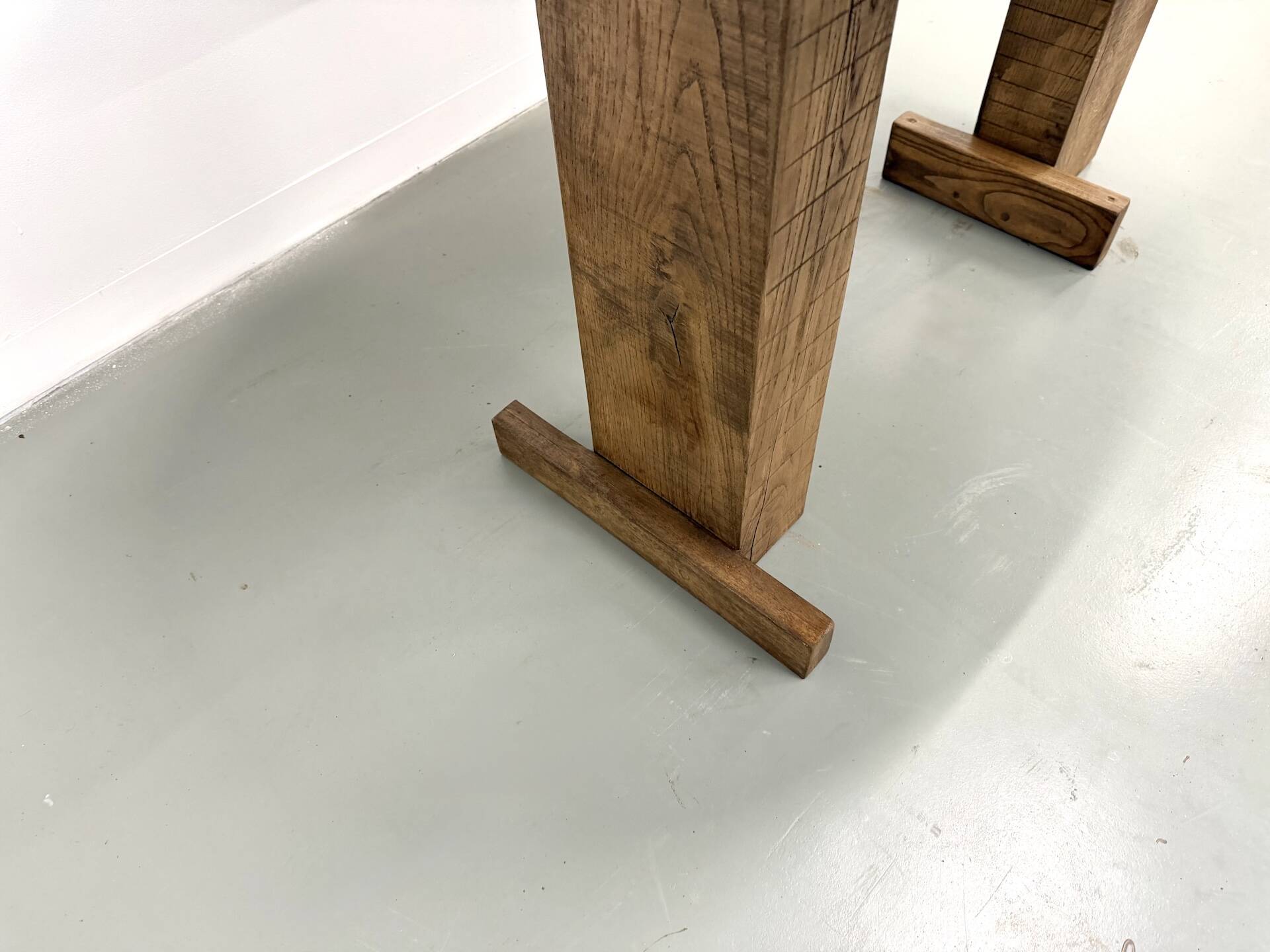 Oval table with T-shaped legs, solid oak, student woodworking project.