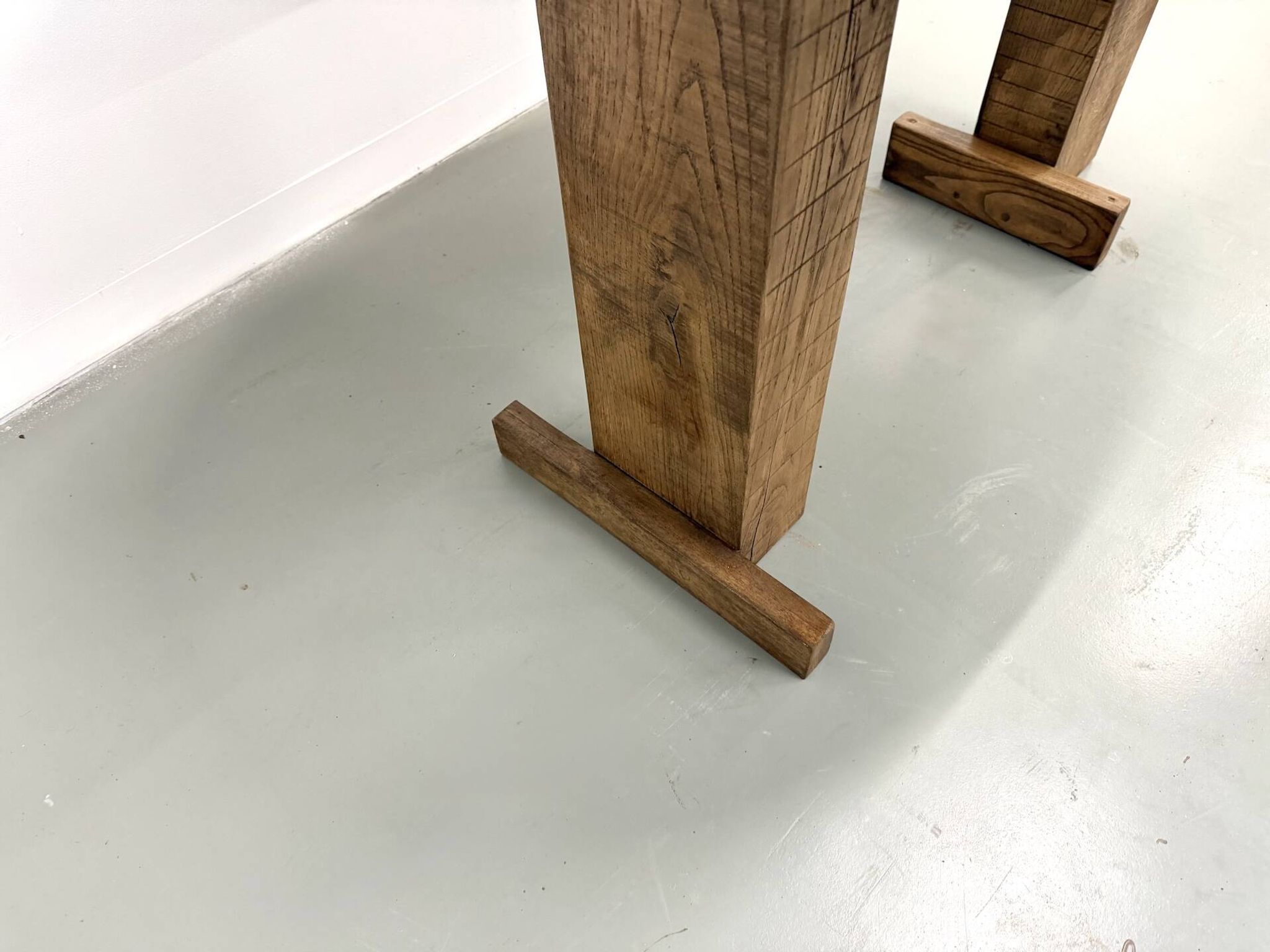Oval table with T-shaped legs, solid oak, student woodworking project.