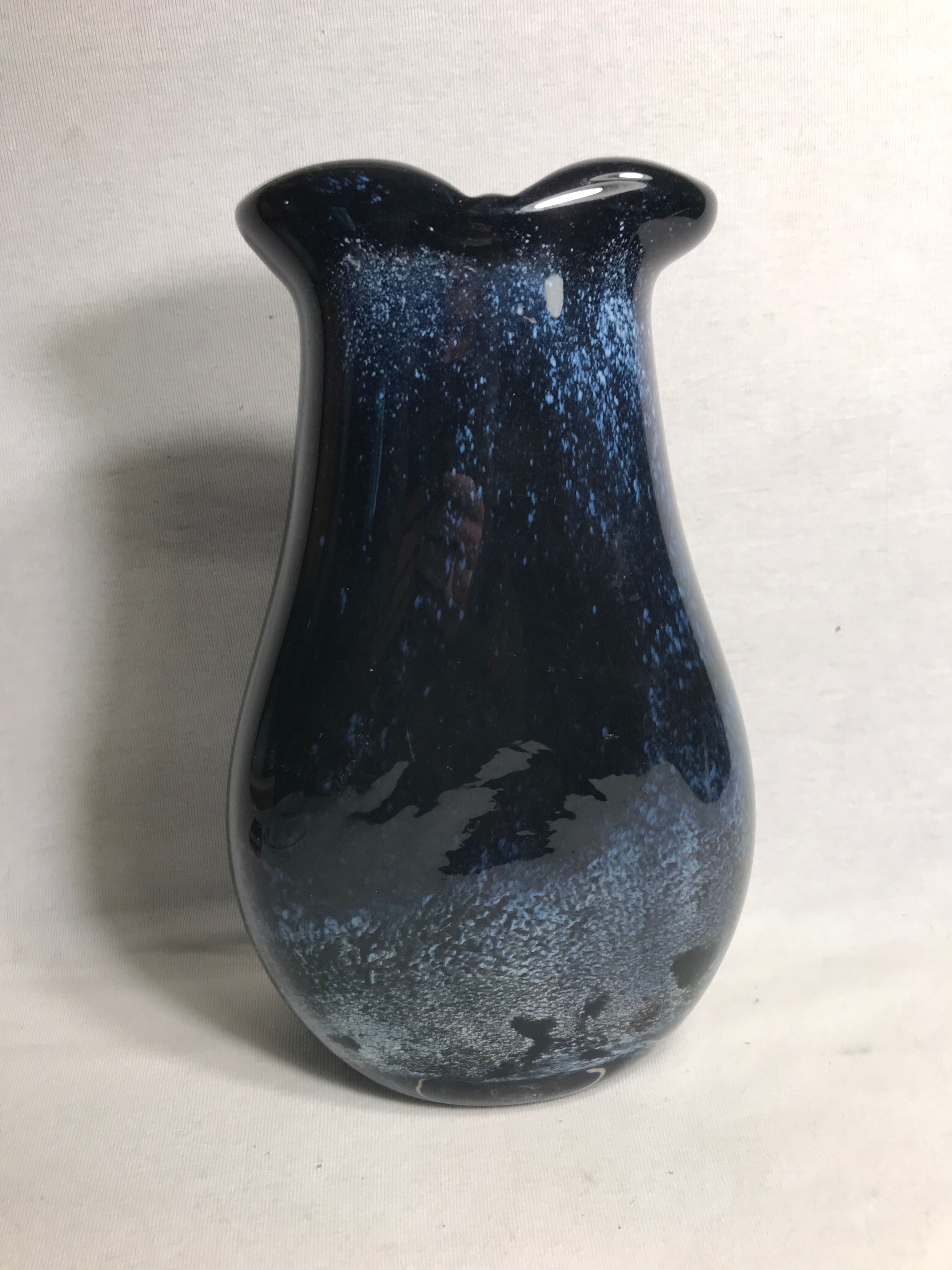 Old glass vase multilayer blue, white vintage interior