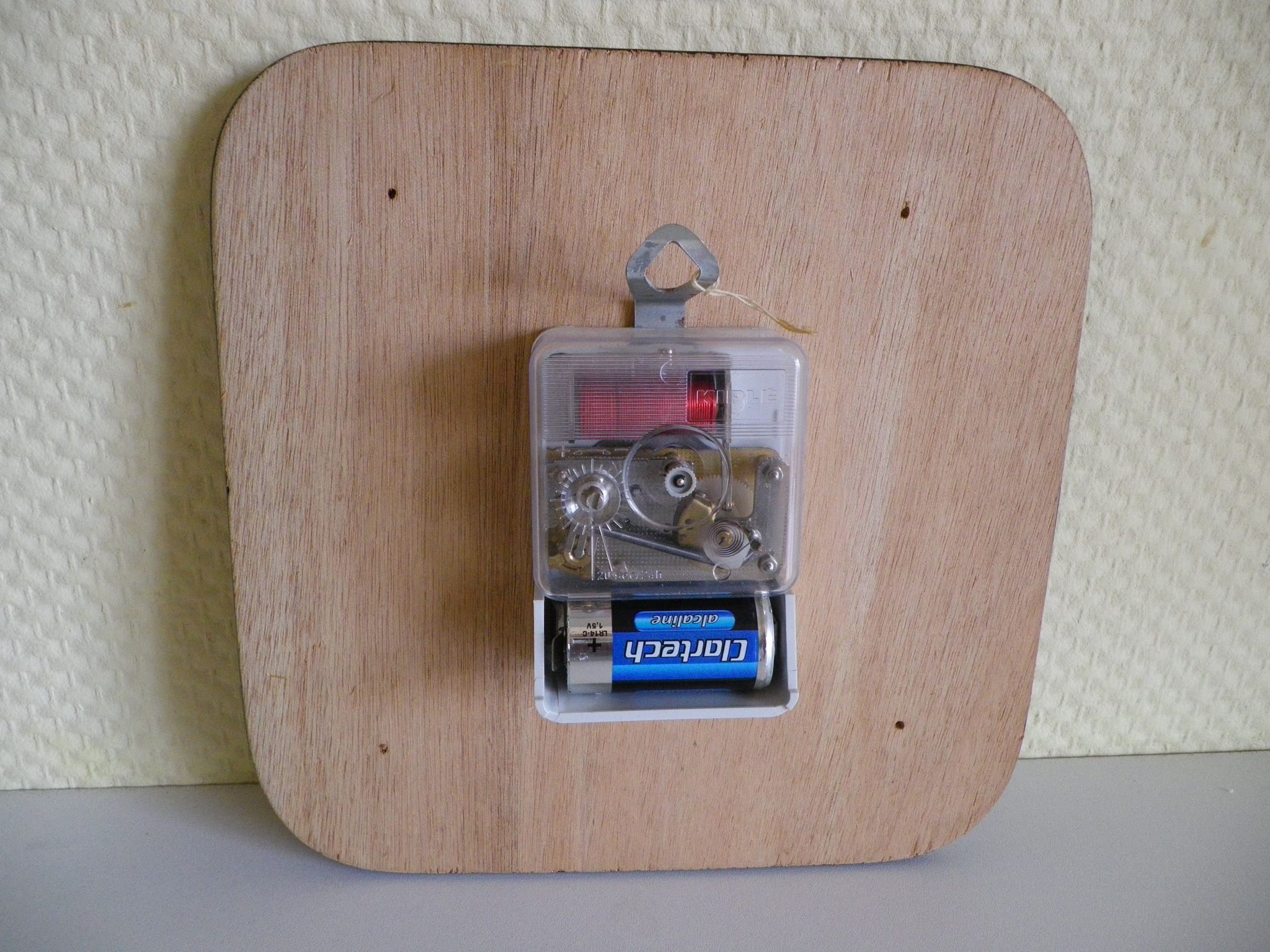 Clock in mahogany formica, metal, wood, glass, in its original box - Brand KIPLE - 70s