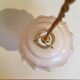 Powder pink opaline hanging and golden woven cord