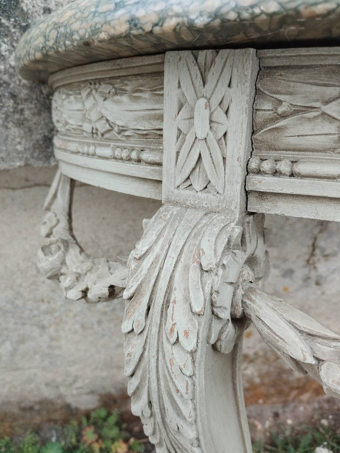 Beautiful antique wooden console with a marble top in Louis XVI style.