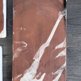 Lot of 4 rectangular glazed terracotta plates.