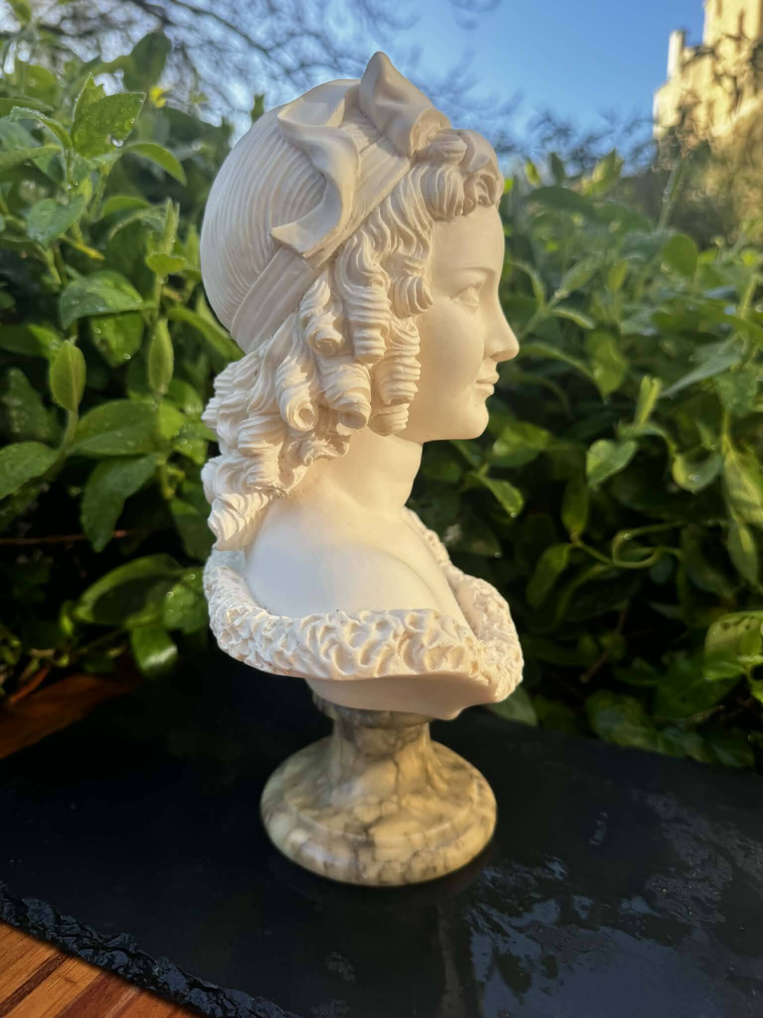 Bust of a woman signed Arnaldo Giannelli dated 1972.