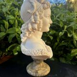 Bust of a woman signed Arnaldo Giannelli dated 1972.