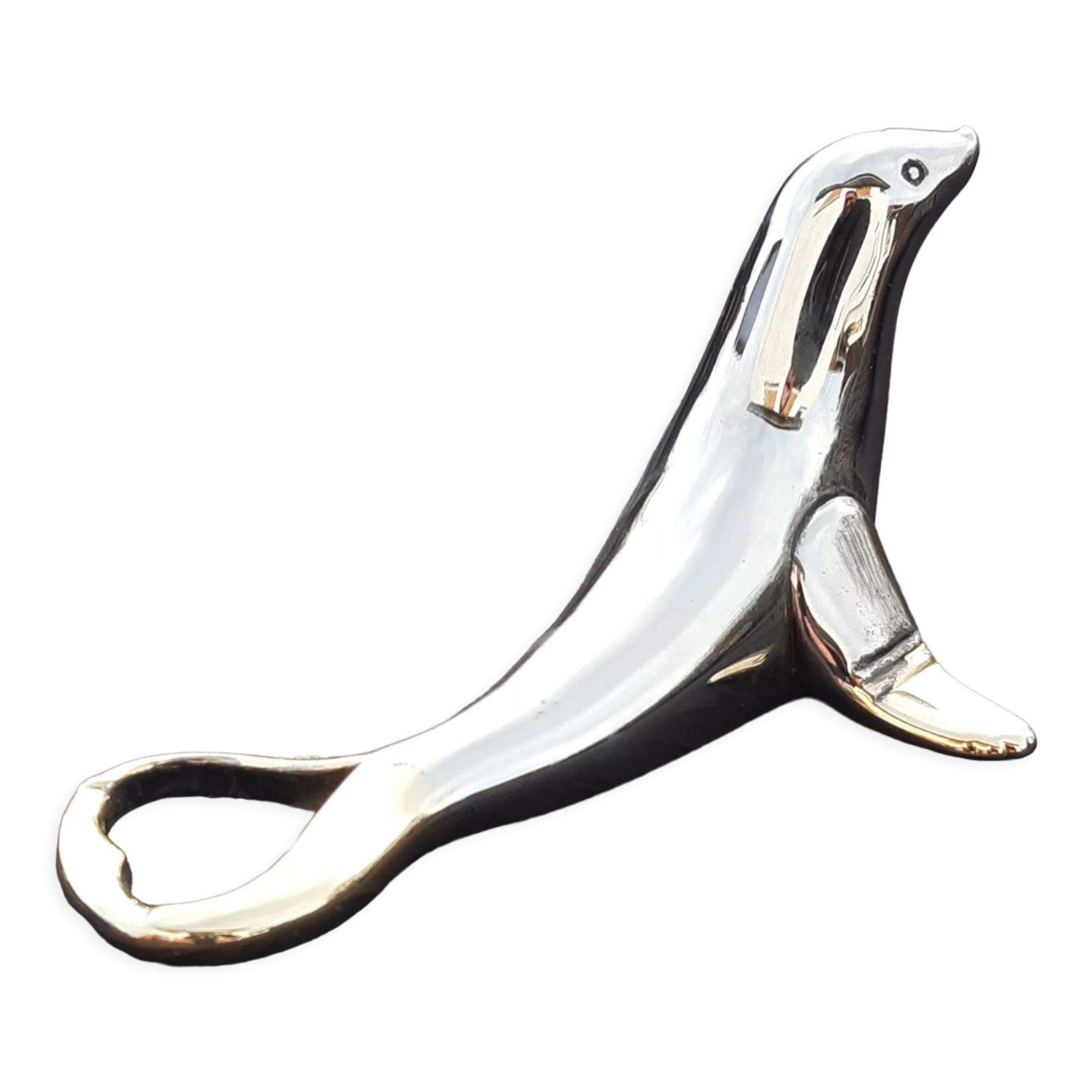 Silver and gold metal sea lion bottle opener