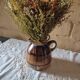 Old sandstone pitcher vase