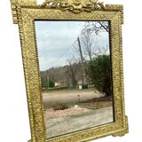 Two antique 19th century mirrors in carved Napoleon oak wood