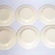 Lot 18 assiettes plates, creuses et dessert 1980