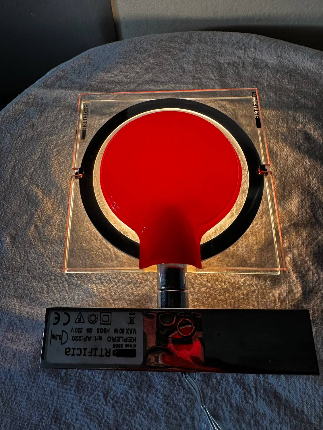 Pair of red Keplero model wall lights, design by chiaramonte