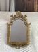 Baroque style mirror, decorated with shells and flowers.