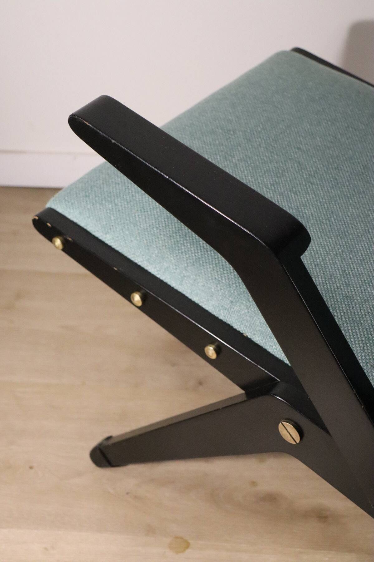 Vintage armchair from the 1960s in black wood and fabric.