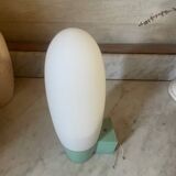 Opaline and Bakelite wall light from the 1950s.