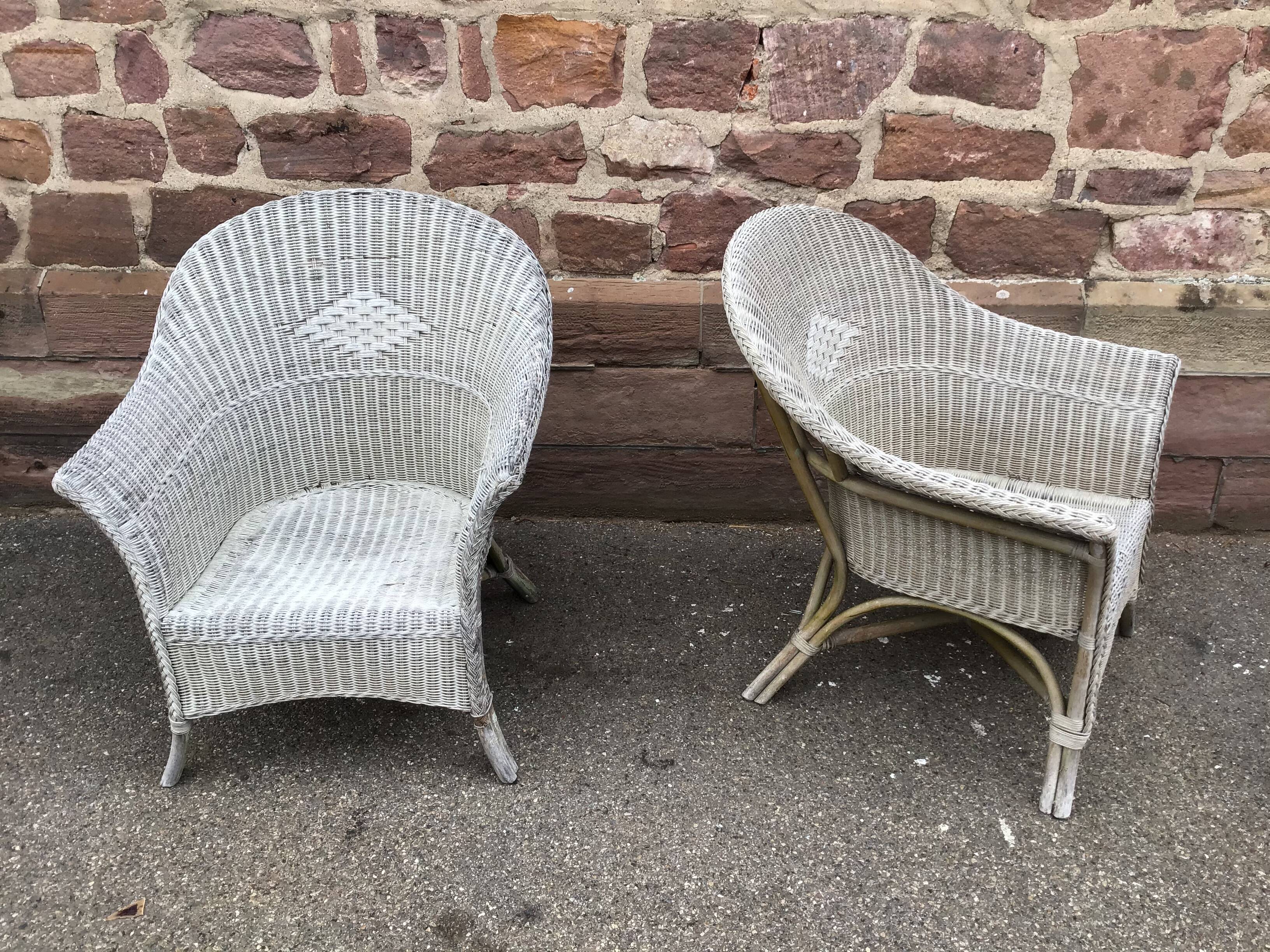 2 vintage grey rattan armchairs from the 60s