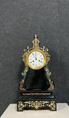 Portico clock of eventful shape of napoleon III period blackened wood inlaid with brass
