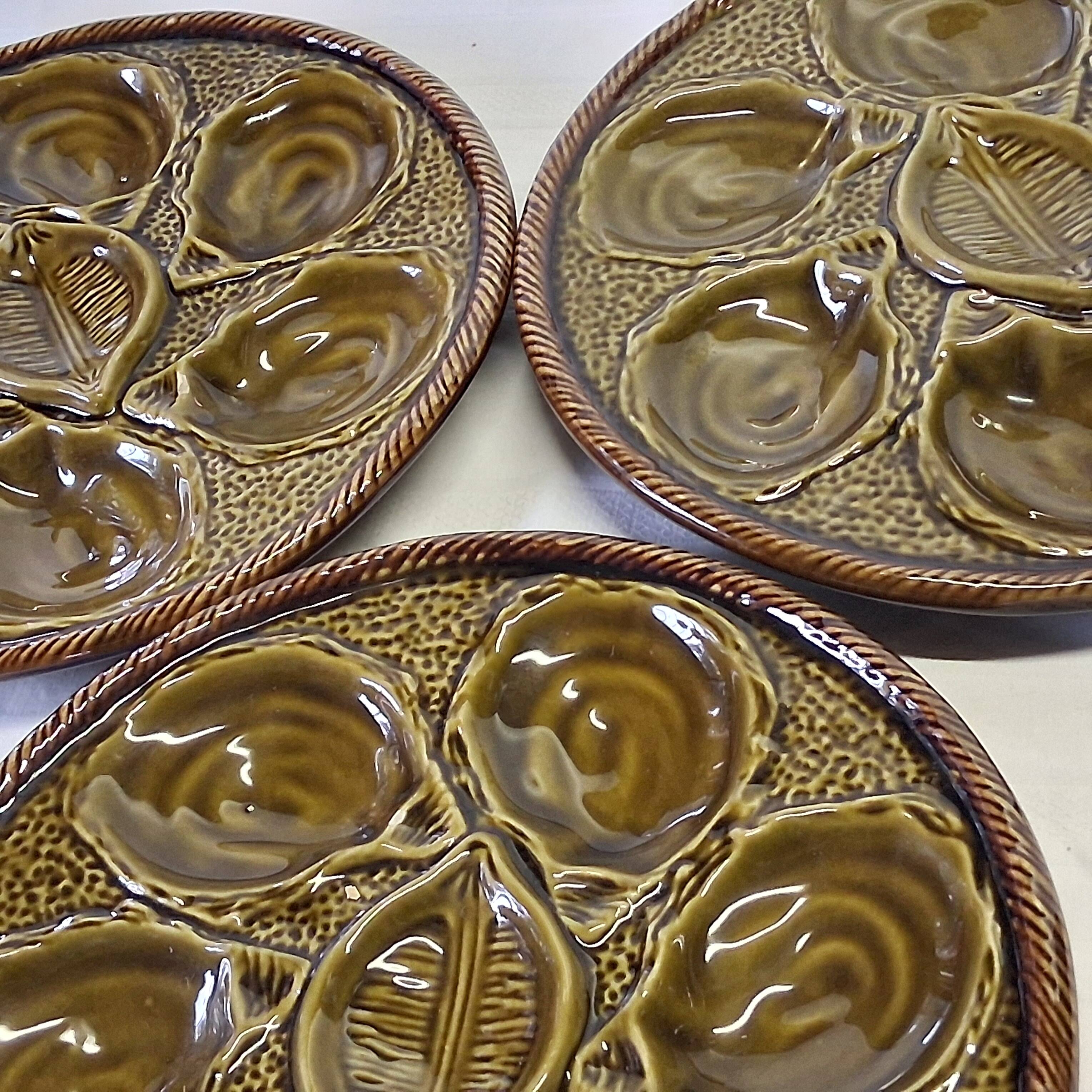 3 green majolica oyster plates from St Clément in good condition.