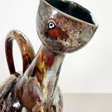 Large bird jug with high neck and handle, signed under the base