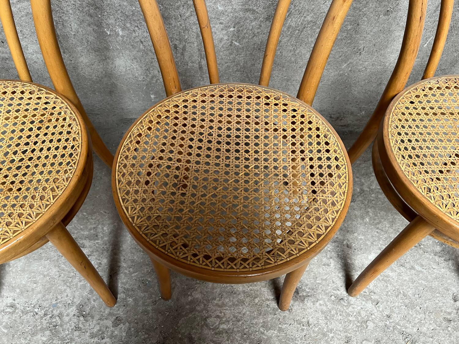 Set of 4 vintage bistro chairs in curved wood and cane seats 1950 1960